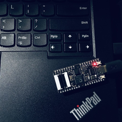 The Sipeed MAix BiT board on top of my laptop keyboard.